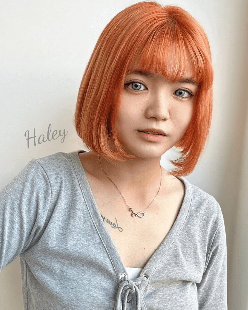 夏日經典款-髒橘色,是一款超顯白的髮色,元氣、個性少女必備。 髒橘色-北勢染髮推薦